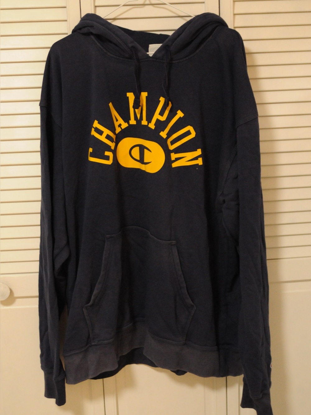 Champion Navy Hoodie with Yellow Logo
